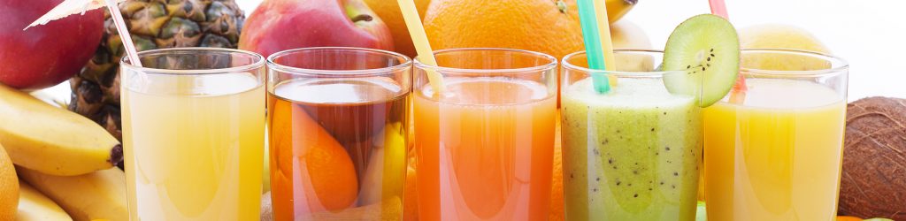 Fruits smoothies, summer cool drinks top view macro. Selective focus, soft light